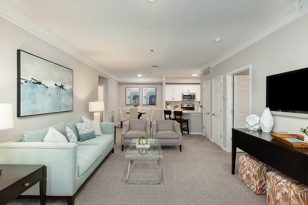 a living room with a couch and a table