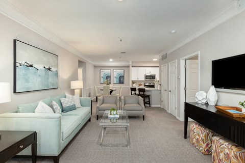 a living room with a couch and a table