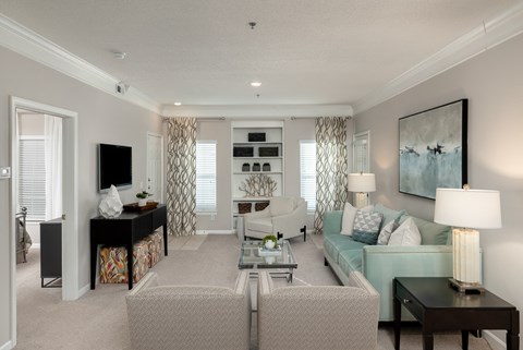 a living room with a couch and a table