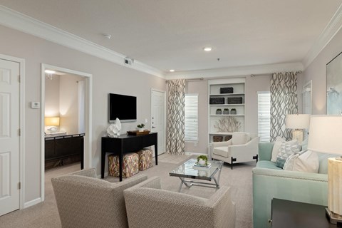 a living room with a couch and a table