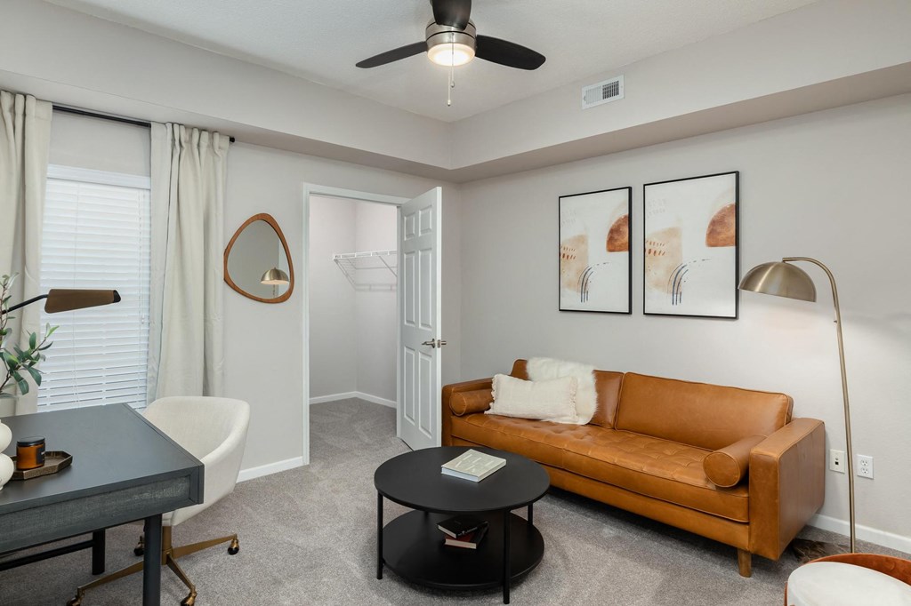 a living room with a couch and a table