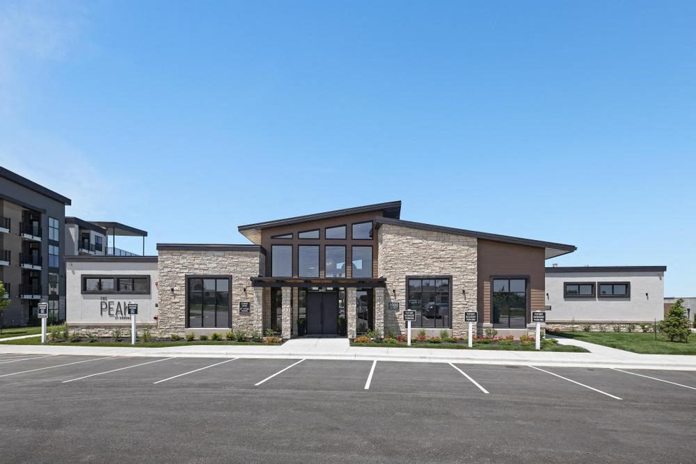 a building with a parking lot in front of it