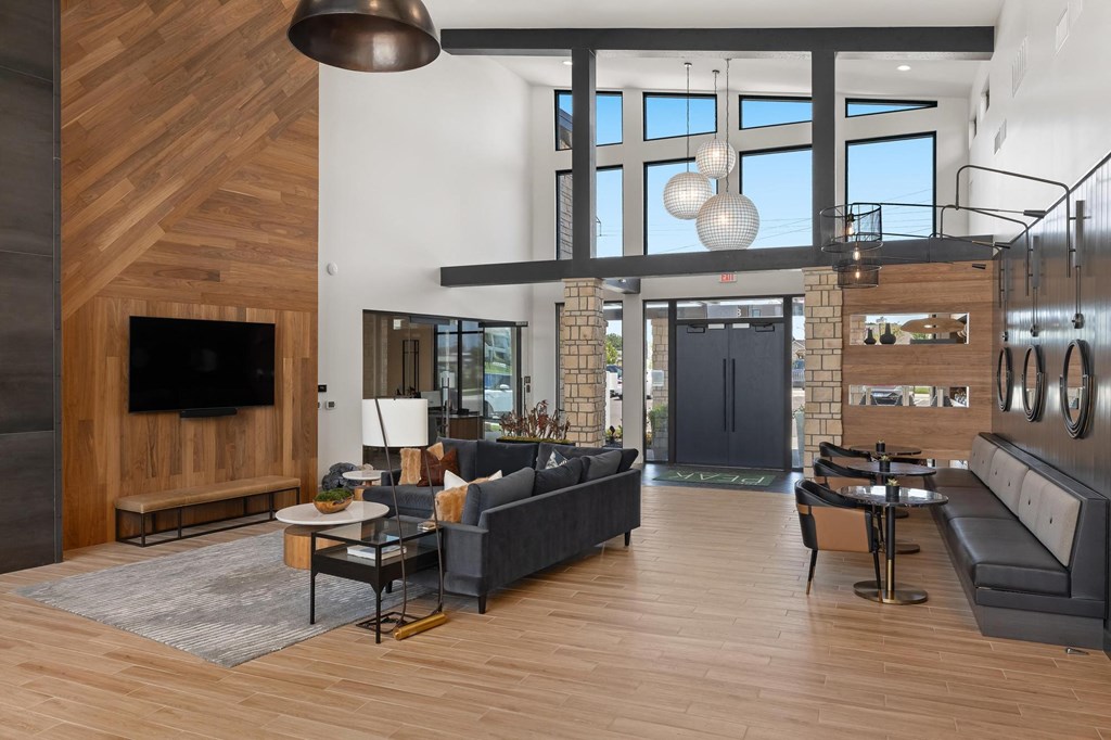 a living room with a couch and a tv