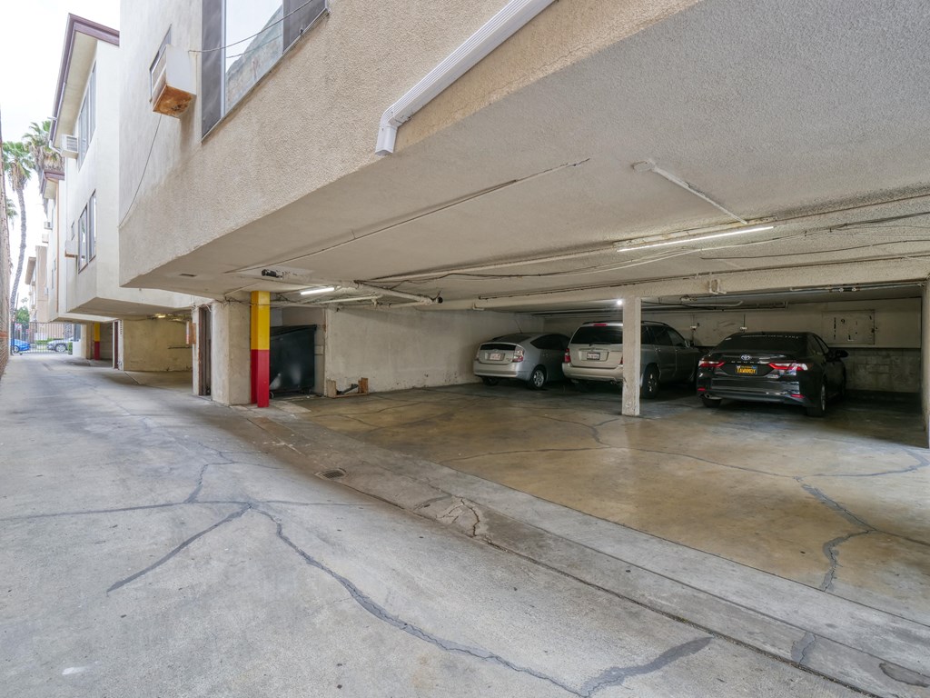 a parking garage with cars parked in it