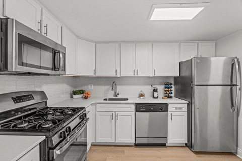 kitchen with white cabinets and stainless steel appliances  at Chestnut Hill Village, Philadelphia, Pennsylvania