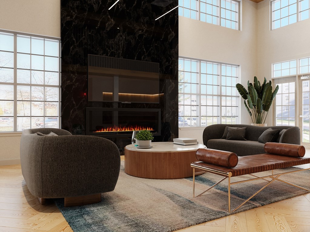 a living room filled with furniture and a fireplace  at Chestnut Hill Village, Philadelphia, Pennsylvania