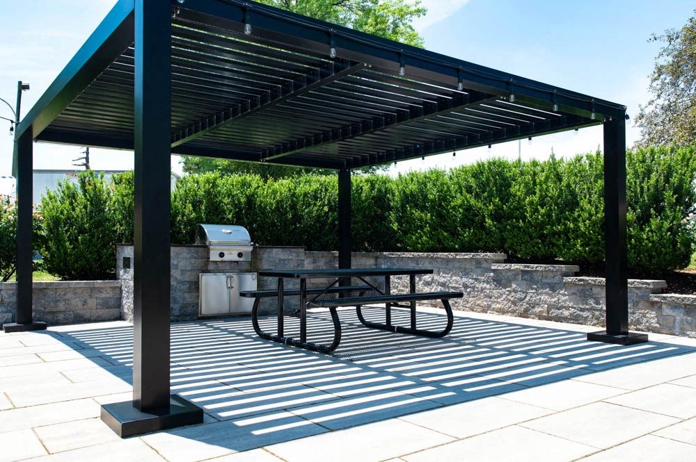 a picnic table under awning on a patio at Chestnut Hill Village, Pennsylvania