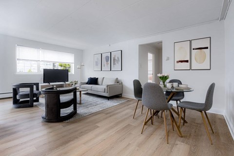 Living and dining room with hardwood floors at Chestnut Hill Village Apartments, Philadelphia, PA