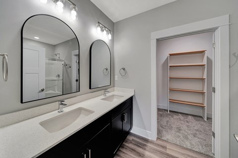 a 3d rendering of a room with different types of outfits on the walls