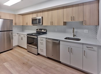 Stainless Steel Appliances Open Kitchen Layout at Brookdale Apartments - Photo Gallery 3