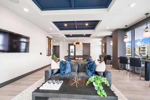 a living room with a couch and a table