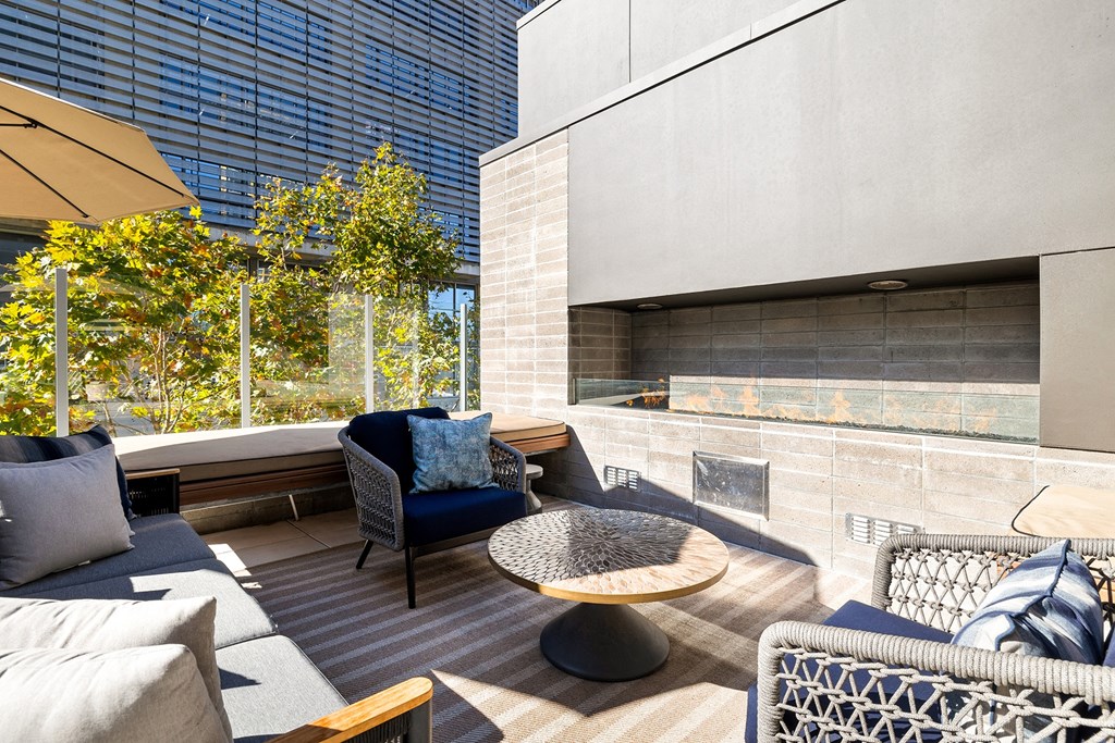 Patio with a couch at K1 Apartments, San Diego