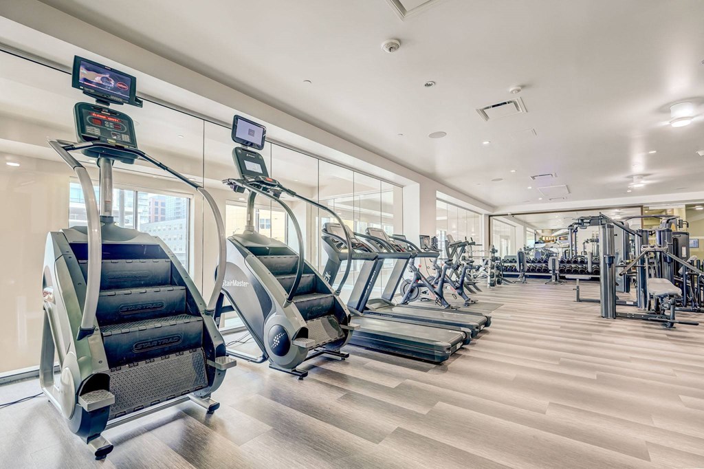 Gym with treadmills and other exercise equipment at ALARA Union Station Apartments, Denver, 80202