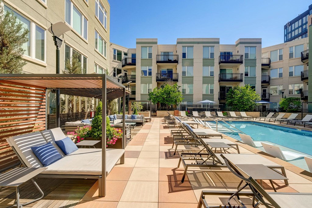 Large pool and lounge chairs at ALARA Union Station Apartments in Denver, 80202