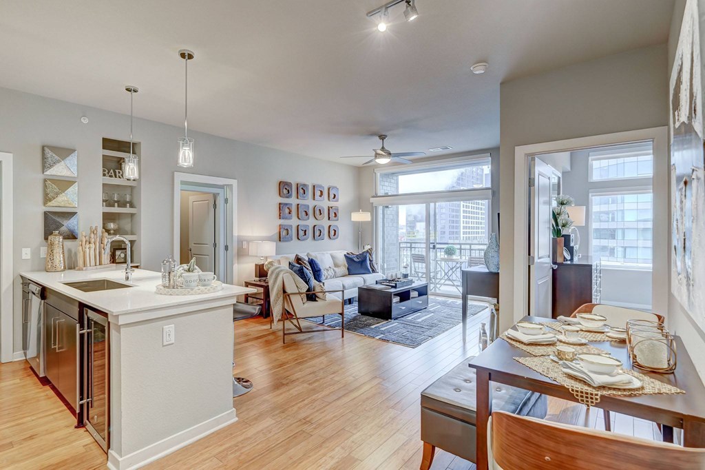 A modern kitchen with a dining table and chairs at Alara Union Station, Colorado, 80202