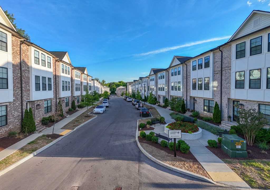Empty street with rows of buildings on either side at 780 Townhomes, Tennessee