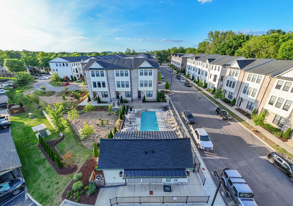 Large apartment complex with a pool in the middle at 780 Townhomes, Franklin, 37064