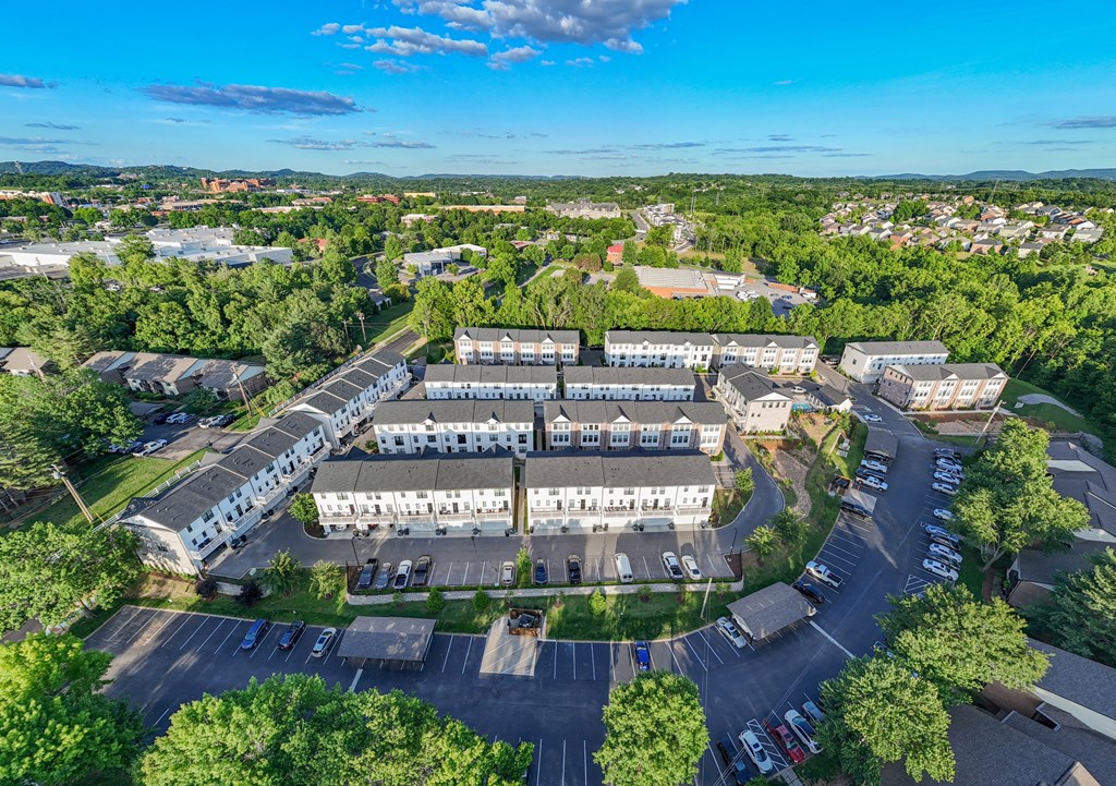 Aerial view of a city with buildings and trees at 780 Townhomes, Tennessee