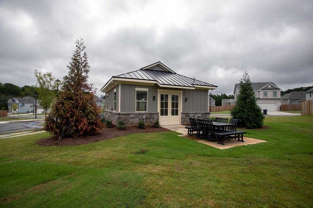 Back side of Clubhouse, outdoor pavilion