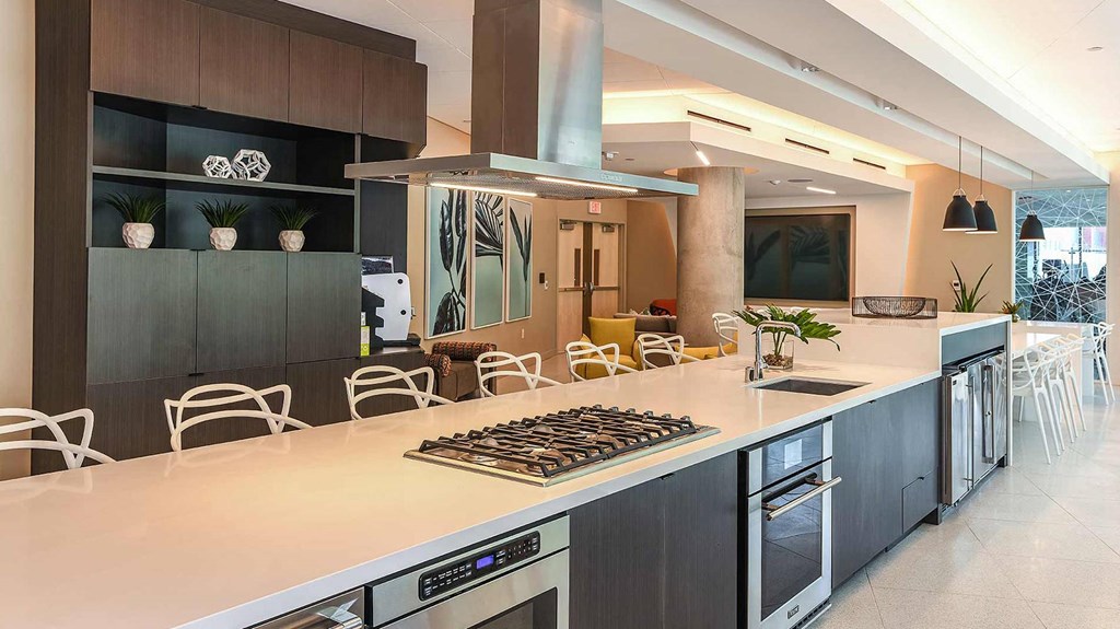 exterior pool areahigh tech business center and conference room at K1 Apartments, San Diego, CA