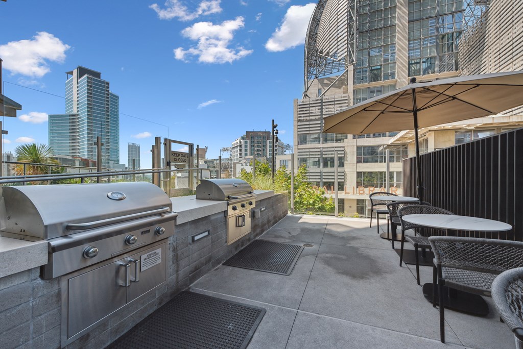 Outdoor patio with a grill at K1 Apartments, San Diego, CA, 92101