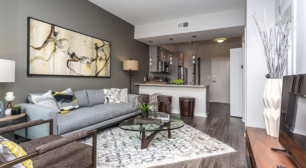 a living room with a couch and a table