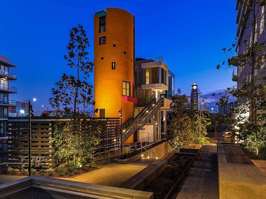 building exterior with night lights at K1 Apartments, San Diego, CA 92101