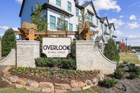 A sign that says Overlook at Mill Creek Established 2021.