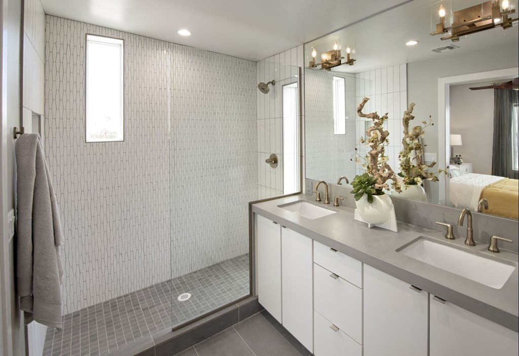 a bathroom with a sink and a mirror at Novella Arcadia, Phoenix, AZ