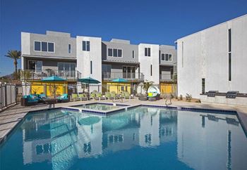 a large swimming pool in front of a building at Novella Arcadia, Phoenix