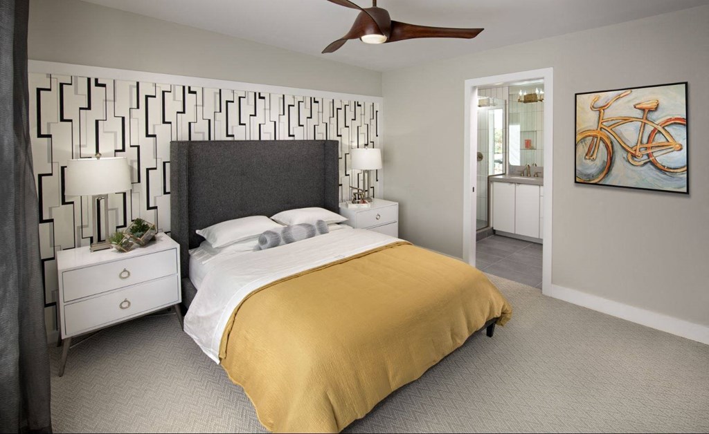 a bedroom with a bed and a ceiling fan a bedroom with a bed and a ceiling fan at Novella Arcadia, Phoenix, 85018