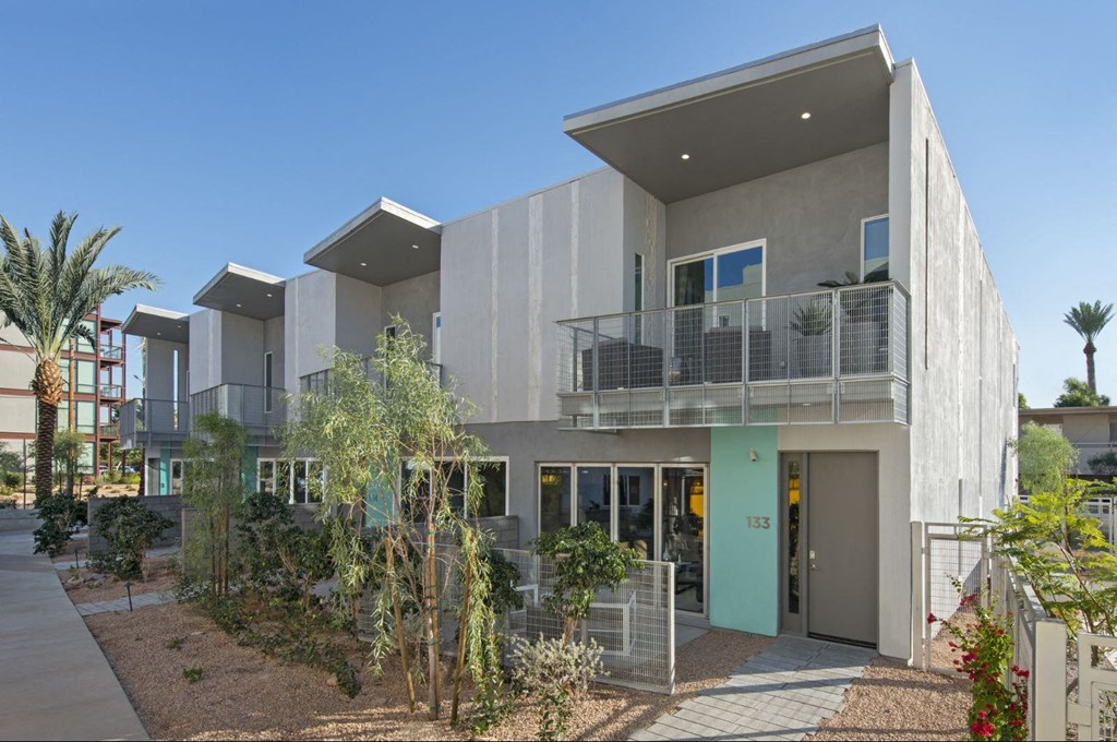 a building with a balcony and a blue sky at Novella Arcadia, Phoenix, AZ 85018