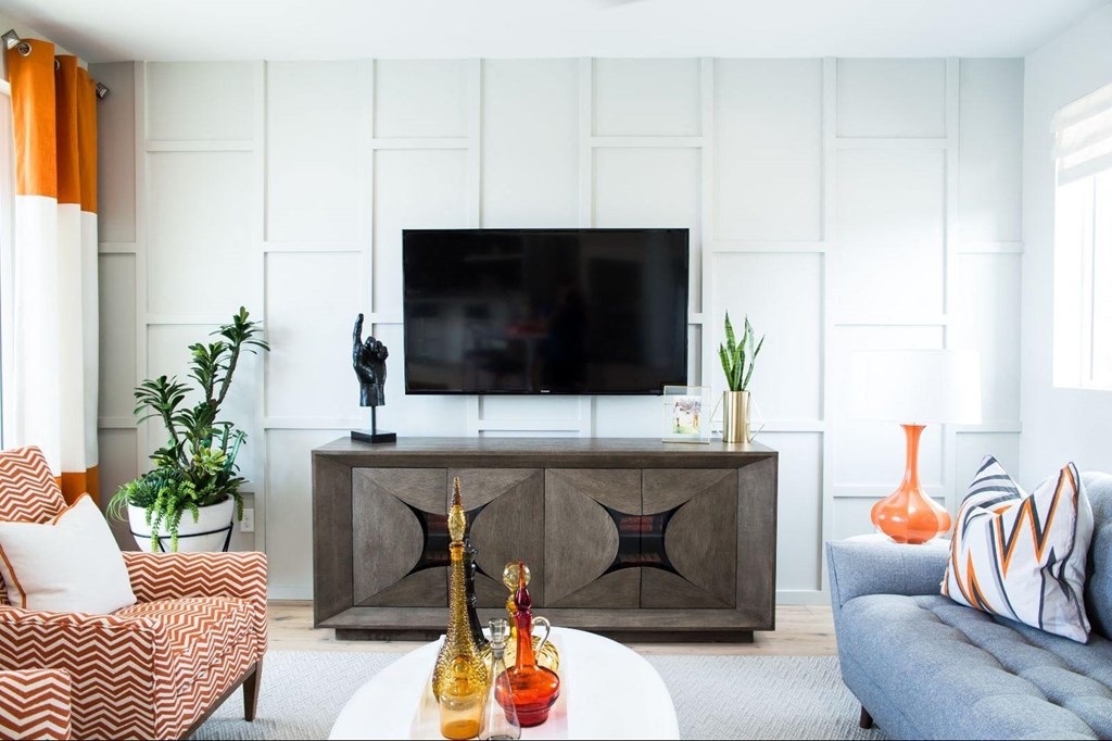 a living room with a couch and a television at Novella Arcadia, Arizona, 85018