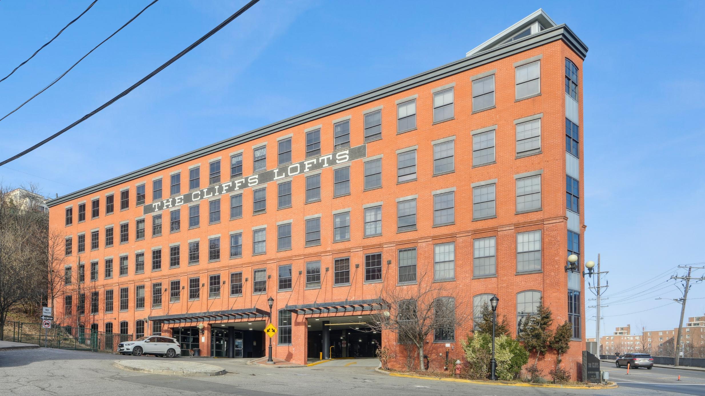 The Cliffs Lofts exterior showing drive in entrance