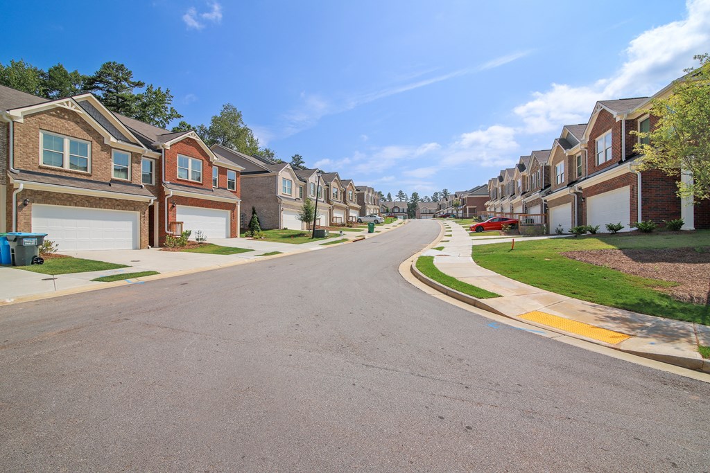 a street with rows of houses on either side