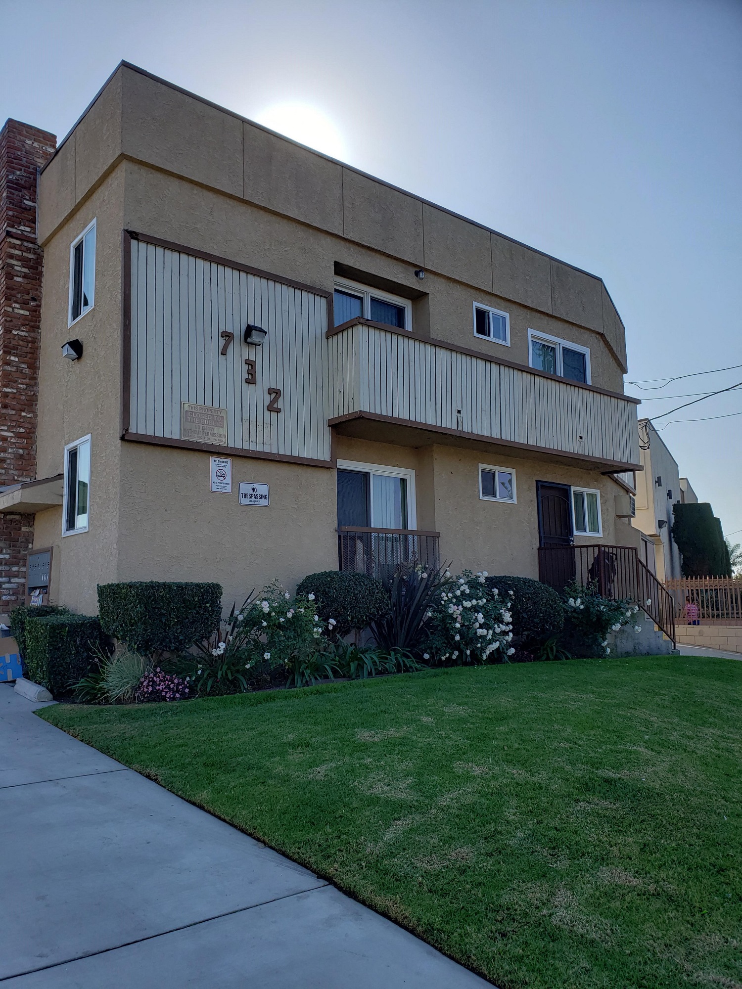 A beige building with the numbers 1-7 on the side.