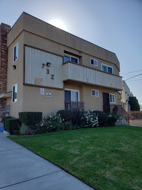 A beige building with the numbers 1-7 on the side.