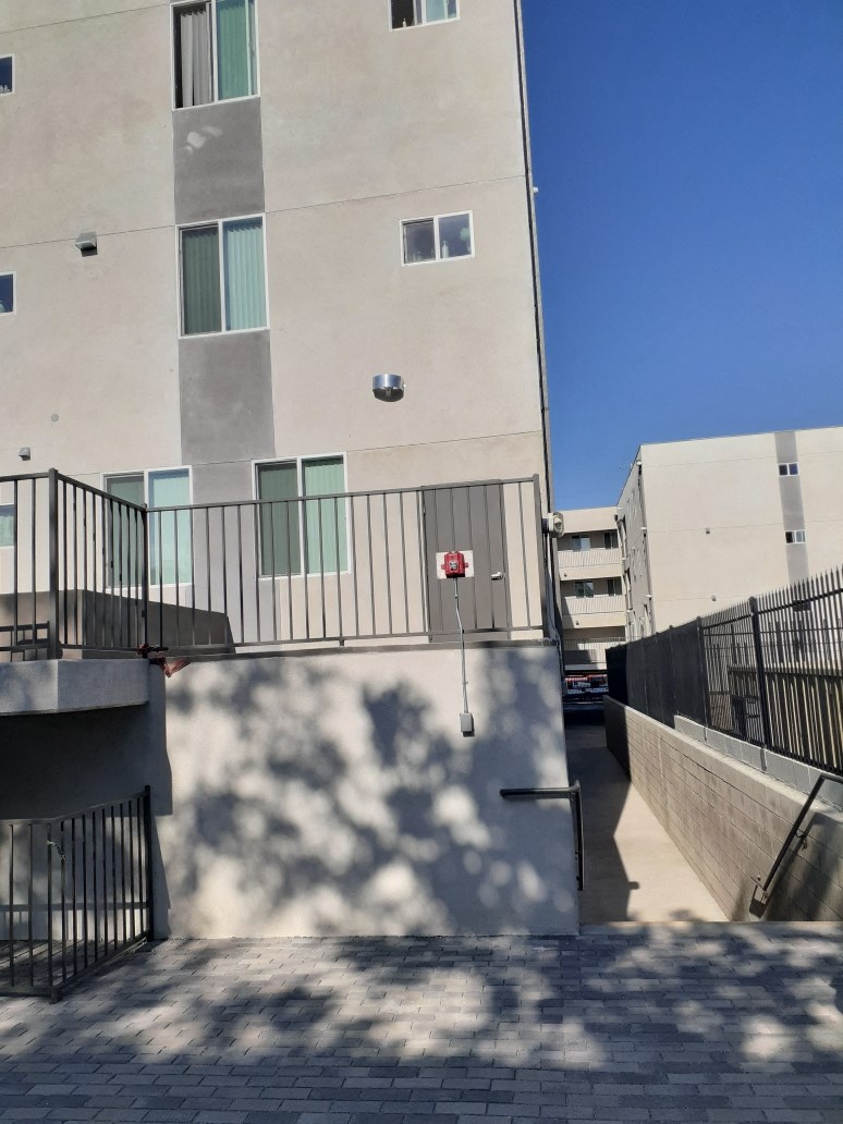 a view of the side of a building from the street