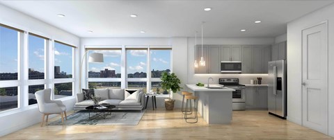 A modern kitchen with a dining table and chairs is adjacent to a living room with a couch and a coffee table.