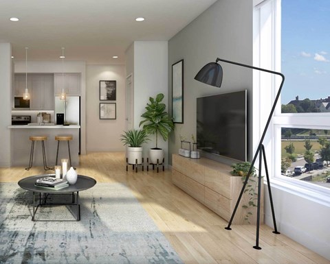 A modern living room with a black floor lamp and a flat screen TV.