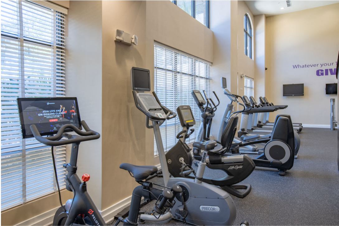 Peloton bicycle and elliptical at The Bartram Apartments in Gainesville, FL 32608