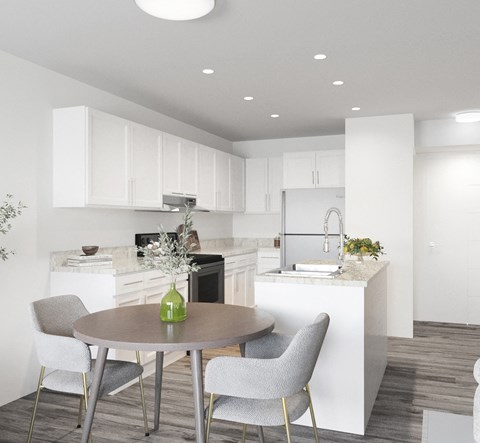 a kitchen with white cabinets and a table and chairs