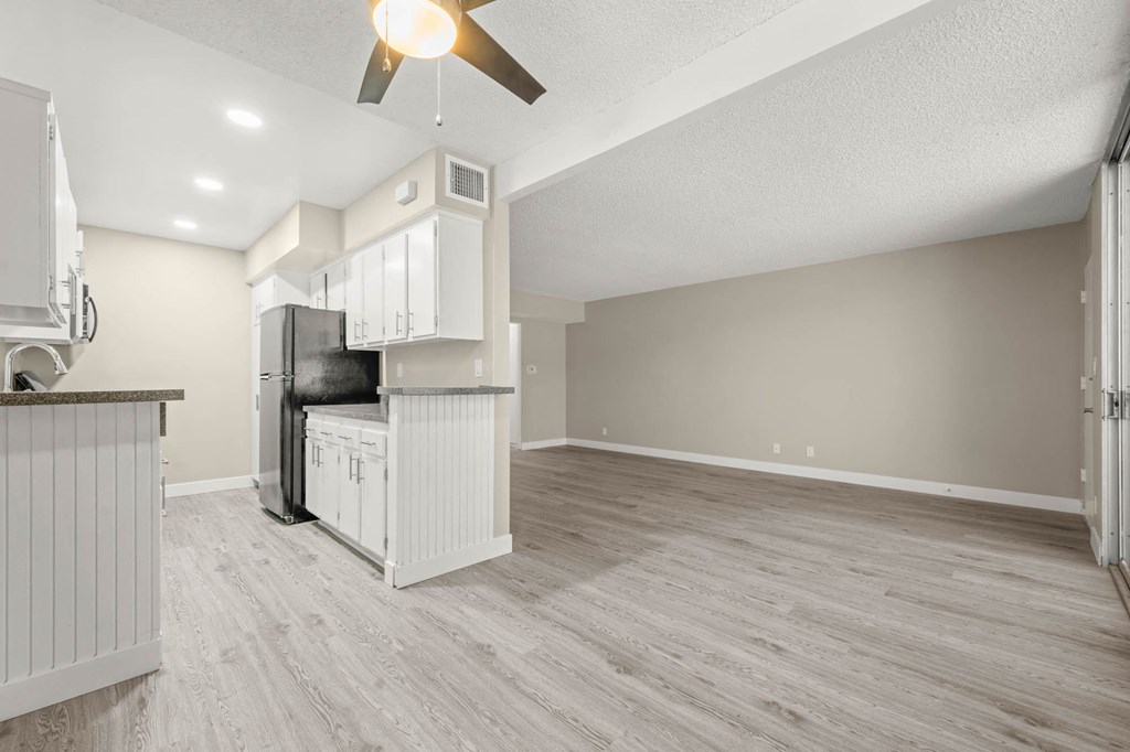 the spacious kitchen and dining room in a 555 waverly unit