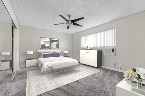 a bedroom with a bed and a ceiling fan