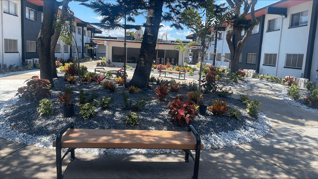 a bench in front of a building