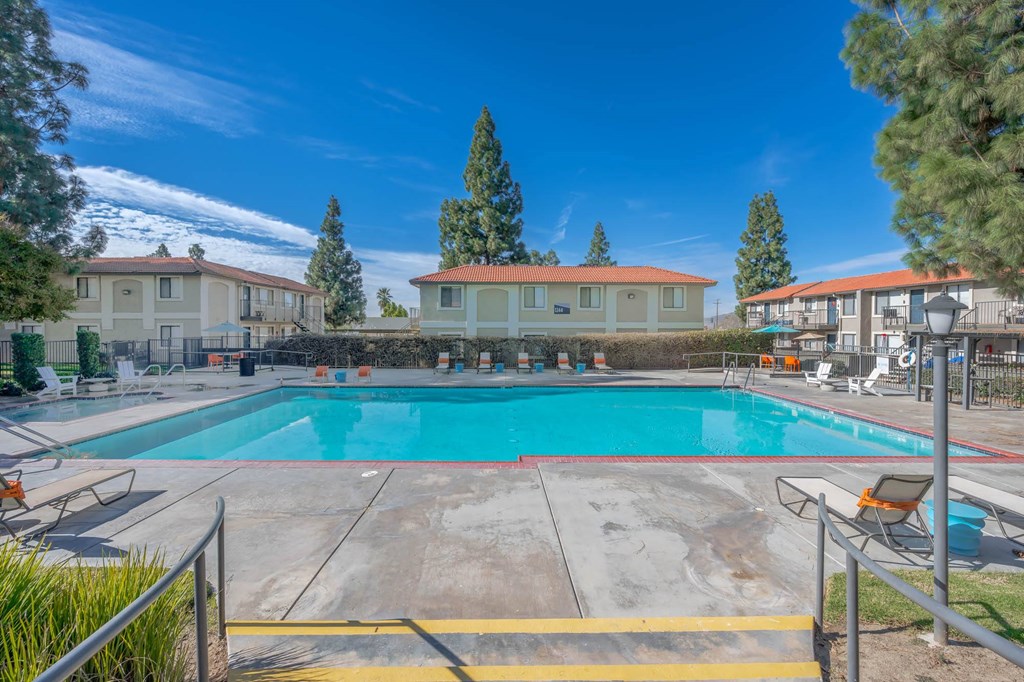 the swimming pool at the enclave apartments