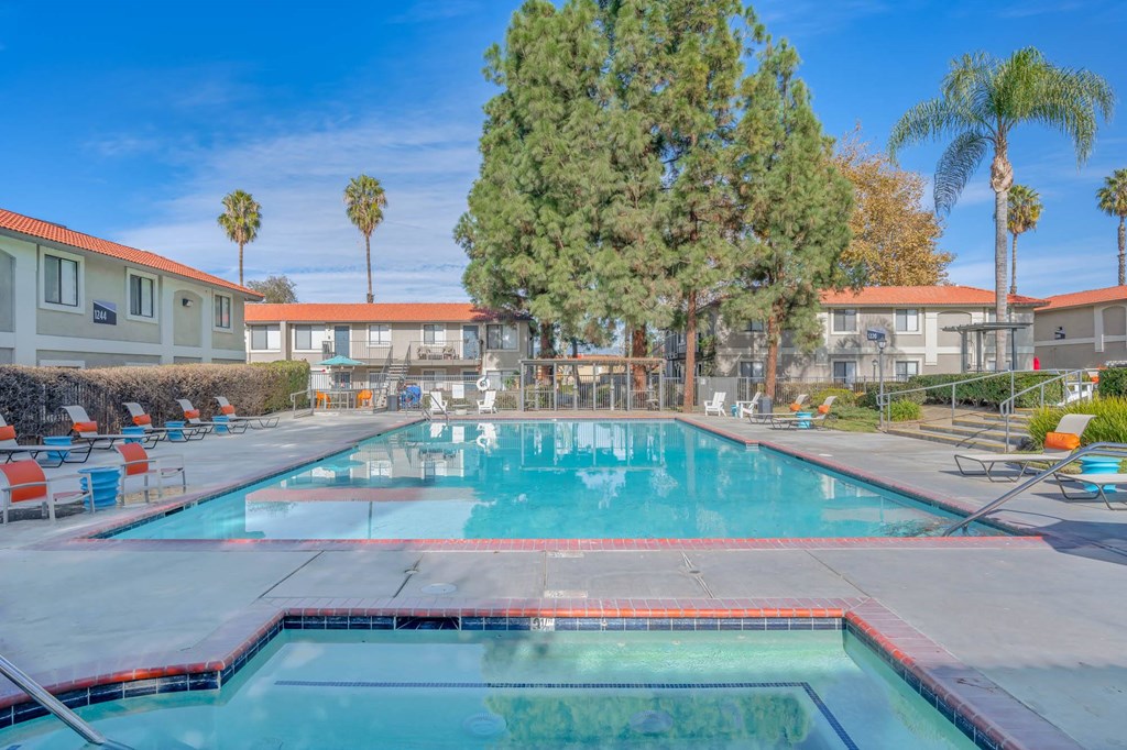the swimming pool at the enclave apartments