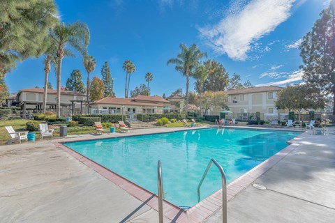 the swimming pool at the enclave apartments