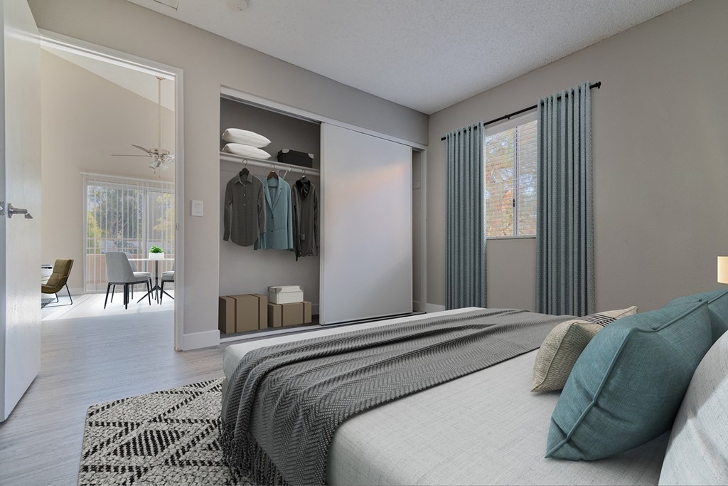 a bedroom with a bed and a closet