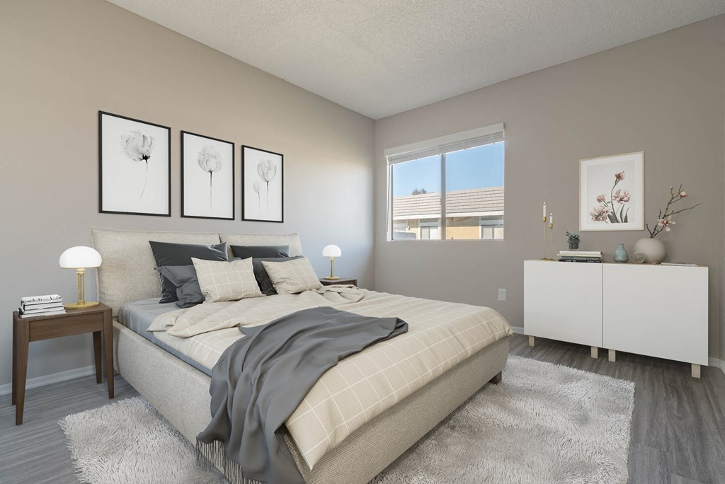 an image of a bedroom with a bed and a window